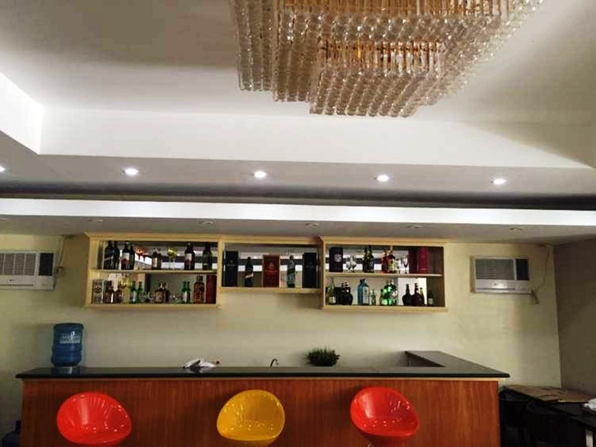 Rainbowland Hotel โอลองกาโป ภายนอก รูปภาพ